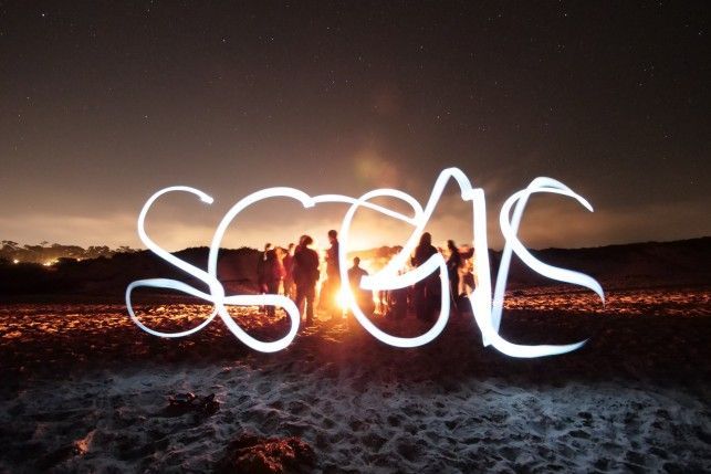 conference bonfire at night with SCGIS letters